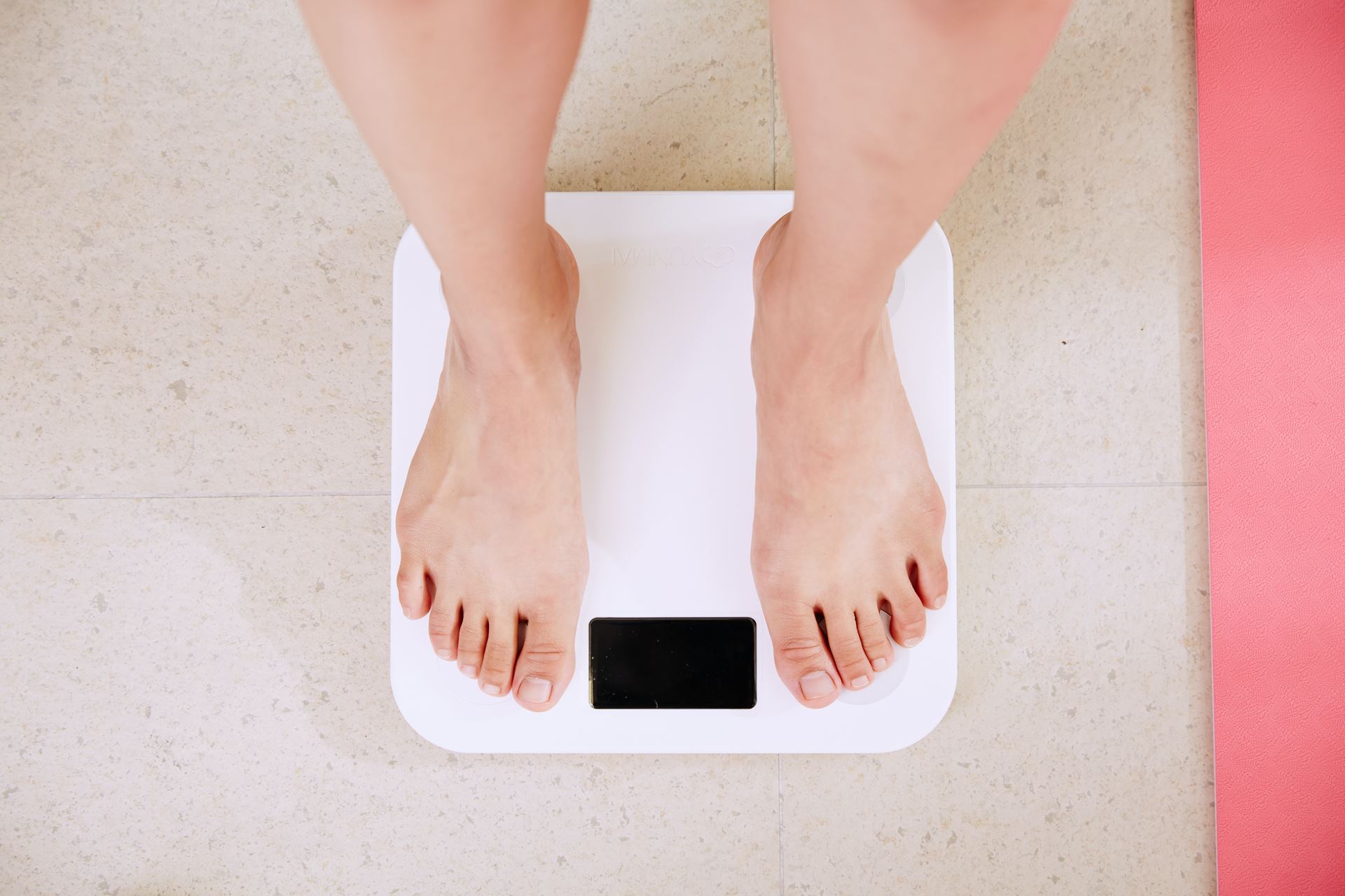 A person standing on scales